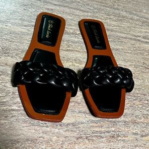 Trish Lucia braided slip on sandals